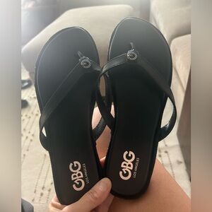 GBG Los Angeles Black Thong Sandals with Silver Logo Accent